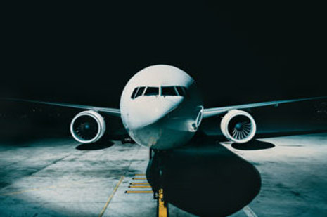 Aircraft on tarmac at night