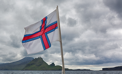 Faroe Islands flag and sky.png