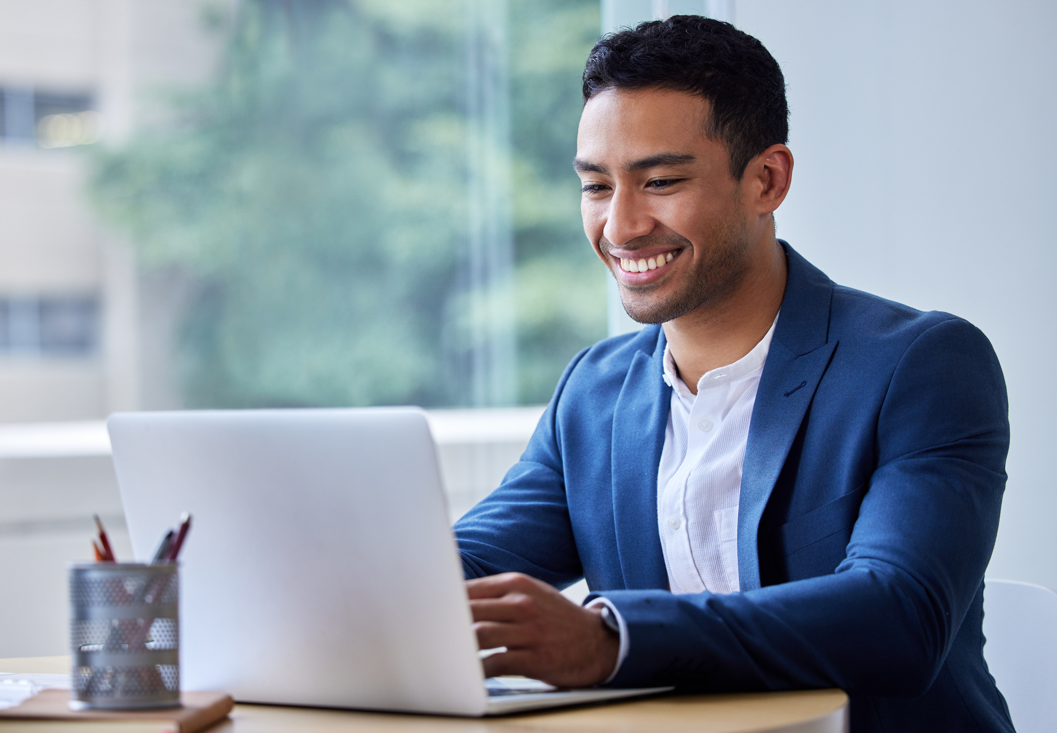 Security analyst using AVSEC Insight on a laptop.jpg