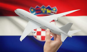Aircraft in hand over Croatia flag.png