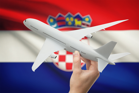 Aircraft in hand over Croatia flag.png