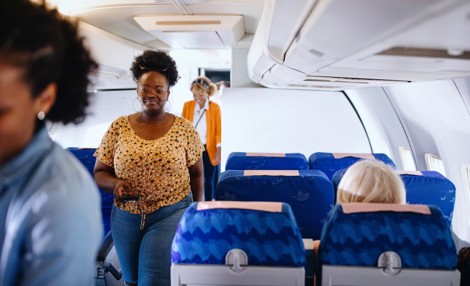 Passengers boarding plane