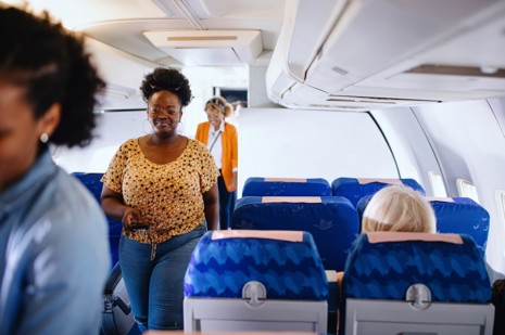 Passengers boarding plane