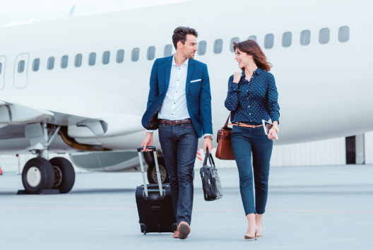 Passengers walking away from an aircraft.png