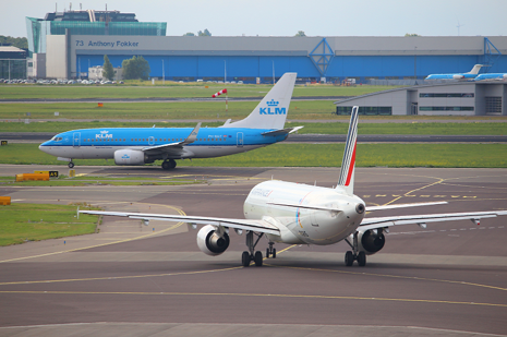 KLM and Air France aircraft on runway.png
