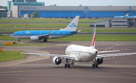 KLM and Air France aircraft on runway.png