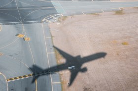 Aircraft shadow over runway