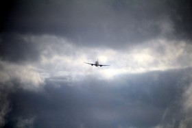 Aircraft in stormy sky