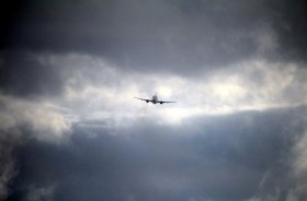 Aircraft in stormy sky